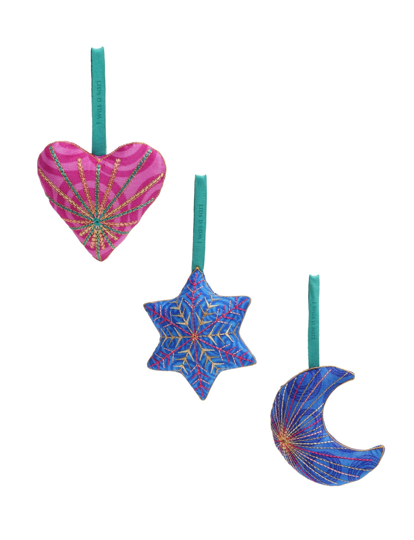 Handcrafted assorted ornaments made from recycled material clothing — featuring heart, snowflake, and crescent moon shapes. Created with repurposed fabric from preloved saris, filled with organic cotton, and detailed with metallic embroidery. A symbol of circular fashion, sustainable women’s clothing, eco friendly fashion, and conscious clothing.