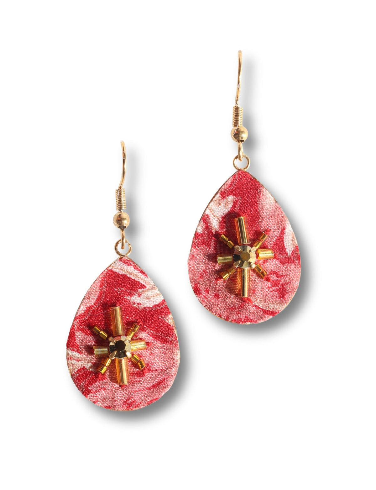 Red abstract teardrop fabric earrings with gold-tone bead and tube embellishments, shown in close-up front view