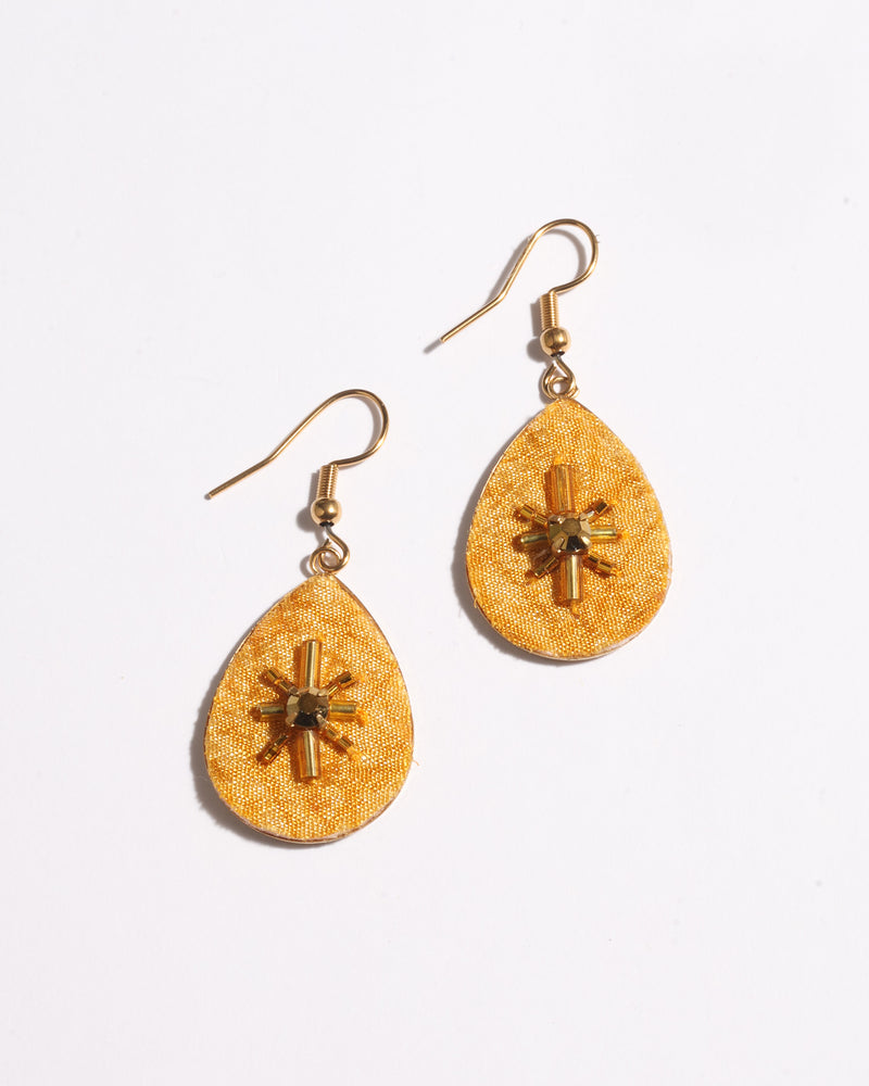 Yellow teardrop-shaped earrings with gold-tone hooks and central bead and tube embellishments, shown flat on white background