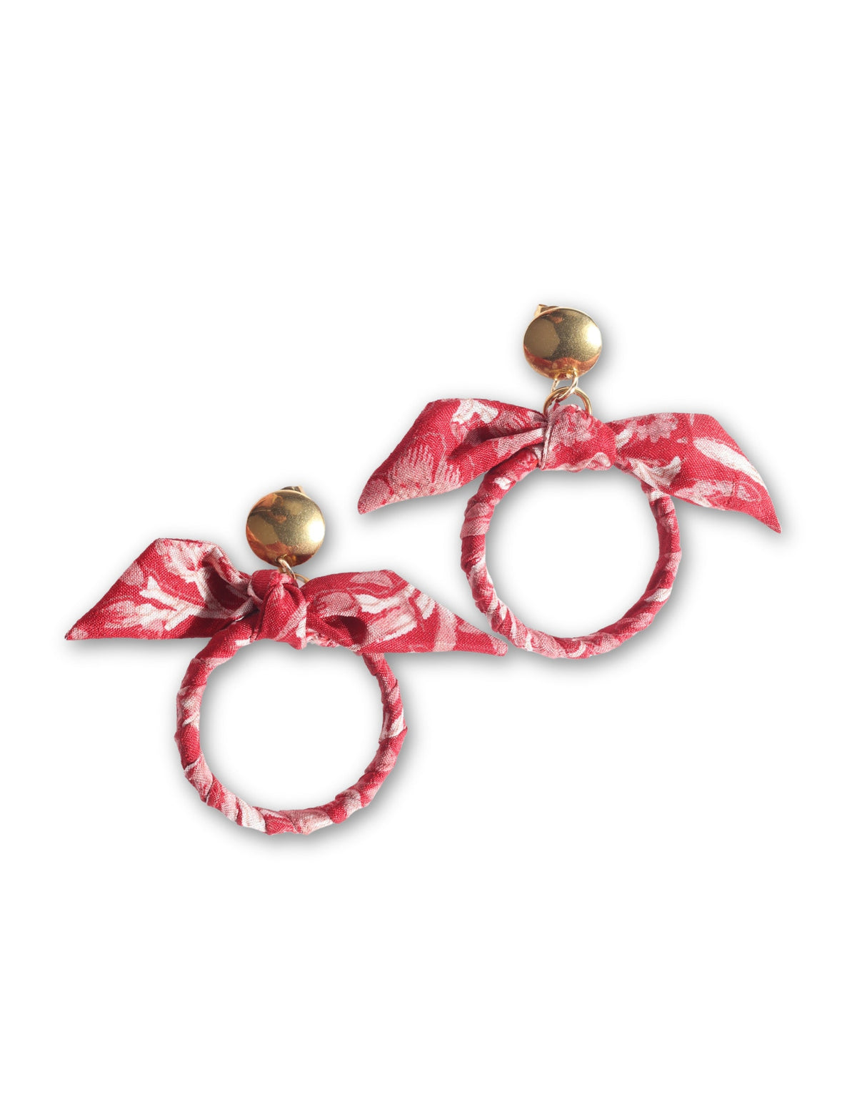 Drop earrings with bow detail and circular ring inspired by upcycled women’s clothing, sustainable women’s clothing, eco friendly clothes, recycled sustainable fashion, carbon neutral clothing, and environment friendly clothing values.