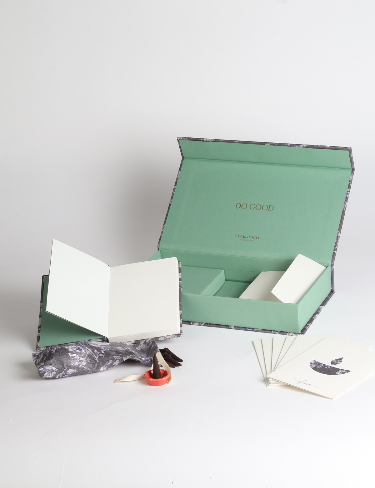 DO GOOD gift box set with hardcover notebook, incense cones, celebration cards with envelopes, and a keepsake box featuring sari detailing.