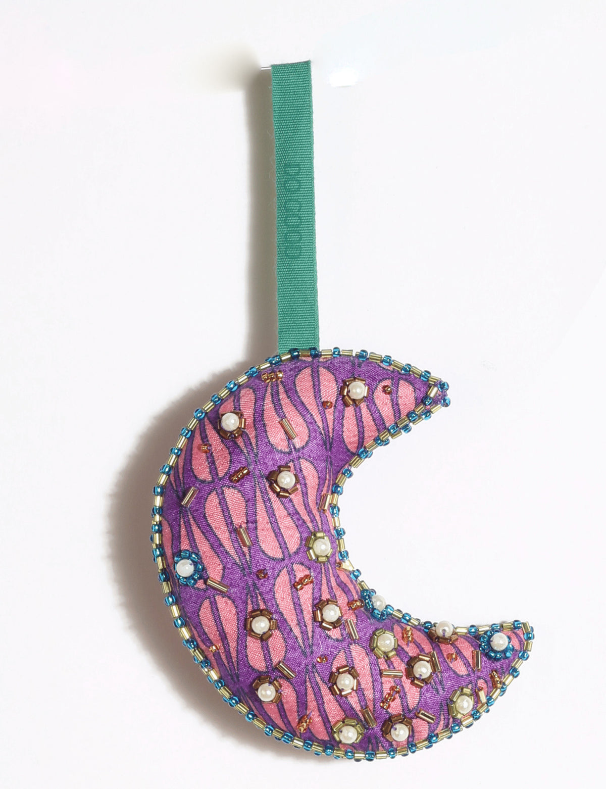 Cheer crescent moon festive ornament made from colorful upcycled sari fabric with Aari embroidery, donated beads and stones.