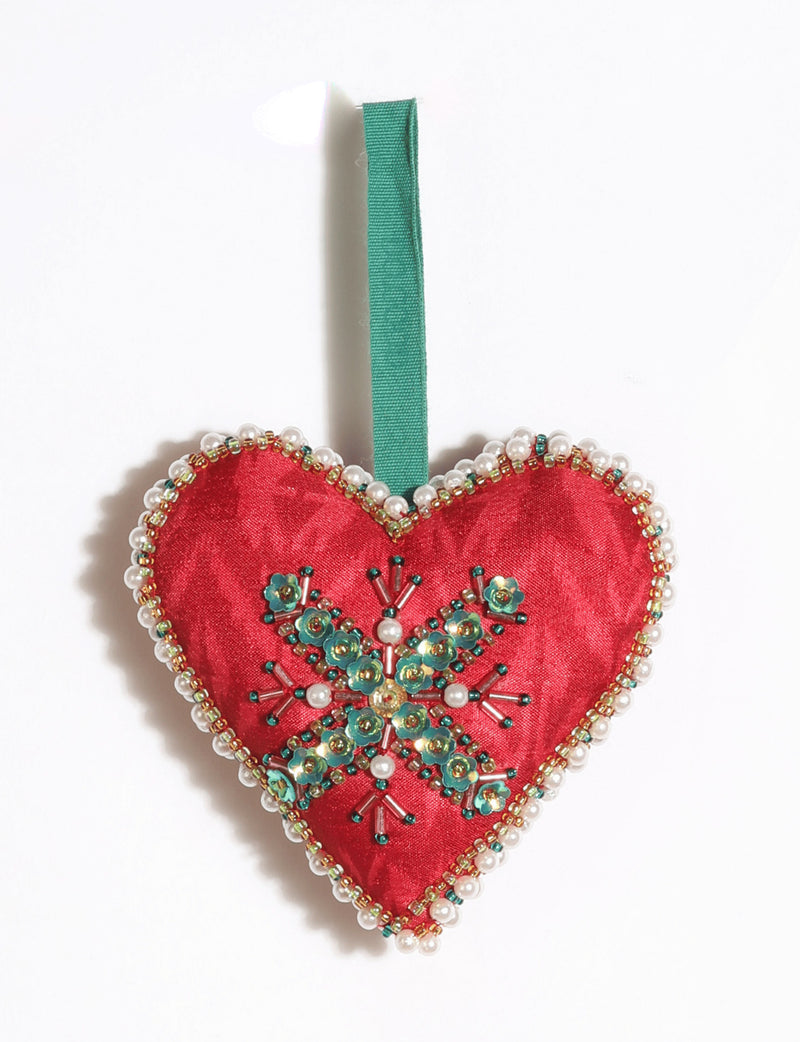 Cheer heart-shaped festive ornament made from vibrant upcycled saris with hand-embroidered Aari work, beads, sequins, and pearls.
