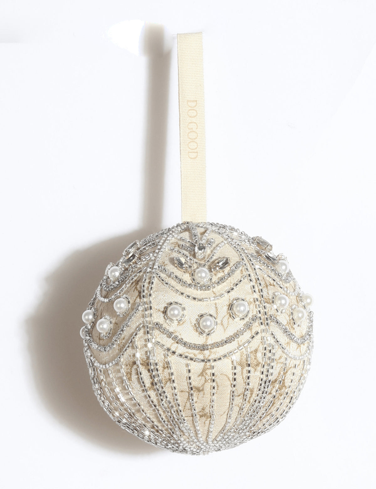Silver embroidered Christmas ball ornament made from upcycled ivory and grey preloved saris, embellished with stones, sequins, pearls and glass beads.