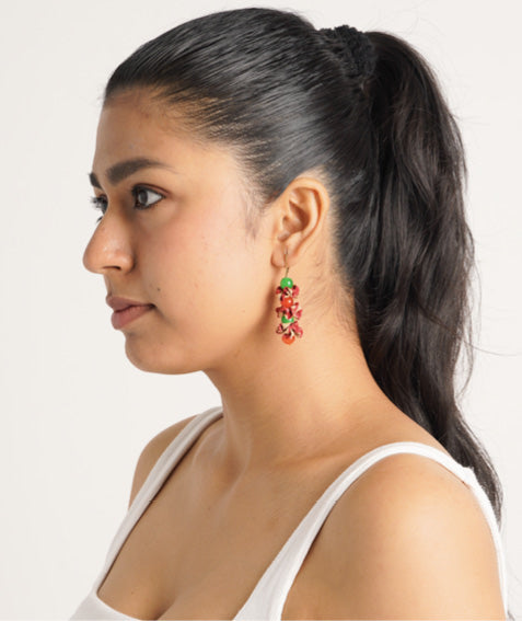 Floret Dangler Earrings featuring colorful beads, made from upcycled materials. These sustainable earrings represent eco-friendly fashion, promoting circular fashion and ethical clothing choices.