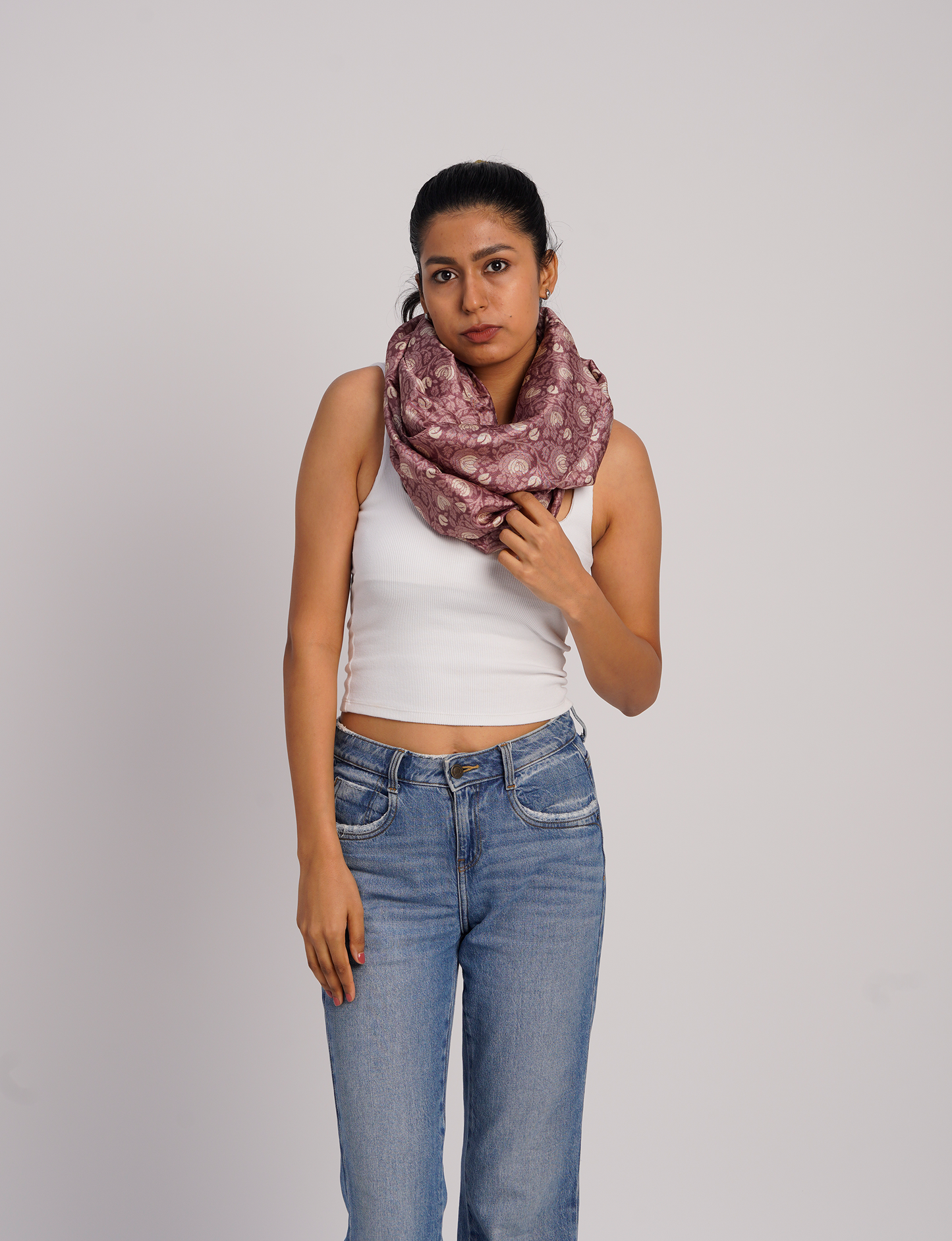 Sustainable style embraces you with our LOOP SCARF – an infinity-style scarf crafted from vibrant, pattern-rich saris. Handcrafted by experienced Mumbai-based artisans, this versatile scarf can be worn looped once or twice around your neck or as a head-wrap. From laid-back beach vacations to dress-to-impress dinners, this scarf is a timeless accessory.