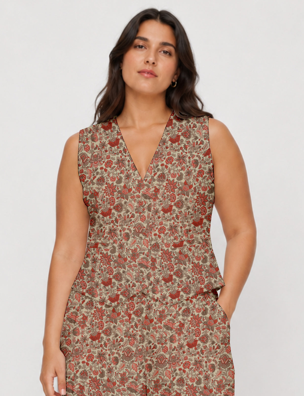 Women's fitted waistcoat with V-neck, single-breasted button closure, tailored silhouette, and pointed hem in sustainable fashion.
