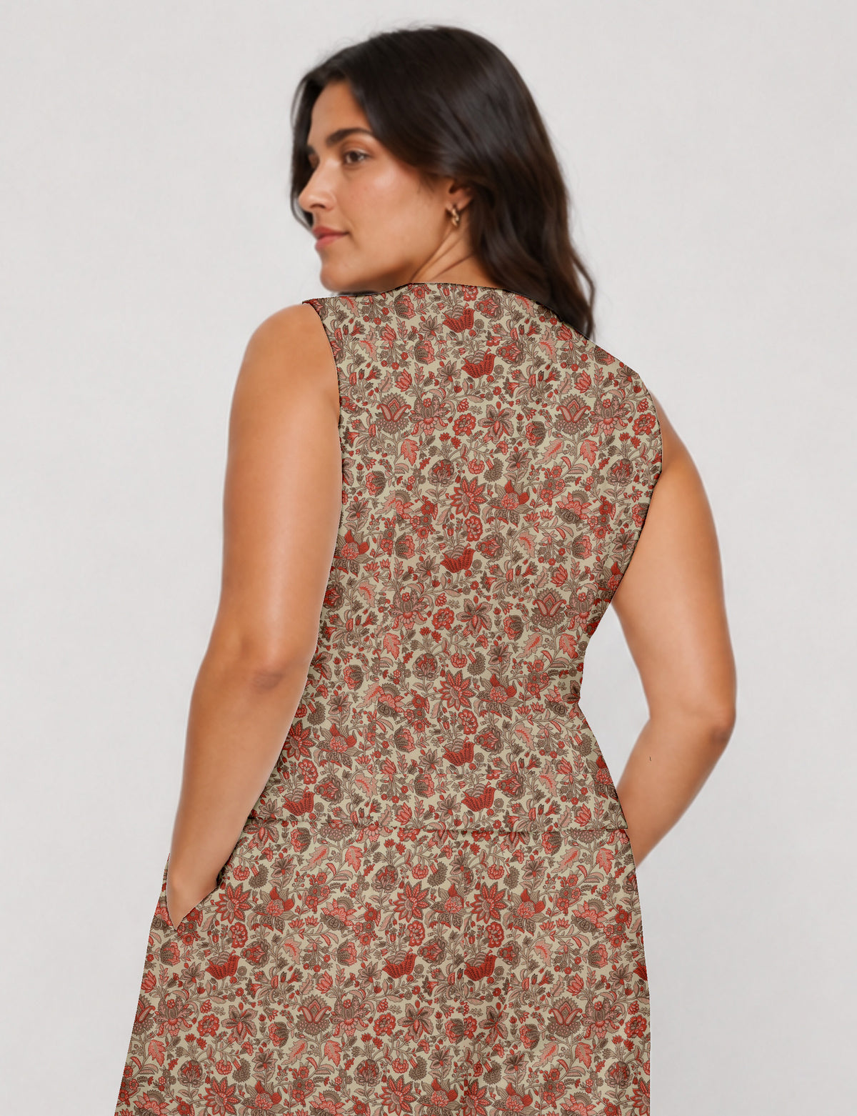 Women's fitted waistcoat with V-neck, single-breasted button closure, tailored silhouette, and pointed hem in sustainable fashion.