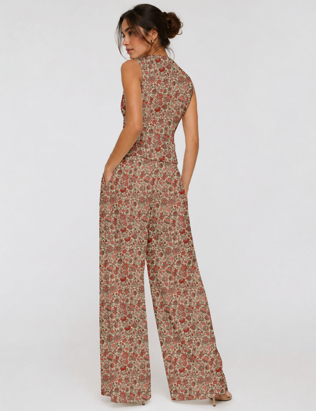Women's tailored waistcoat set with a sleeveless V-neck button-front waistcoat and high-rise wide leg trousers in a coordinated matching outfit.