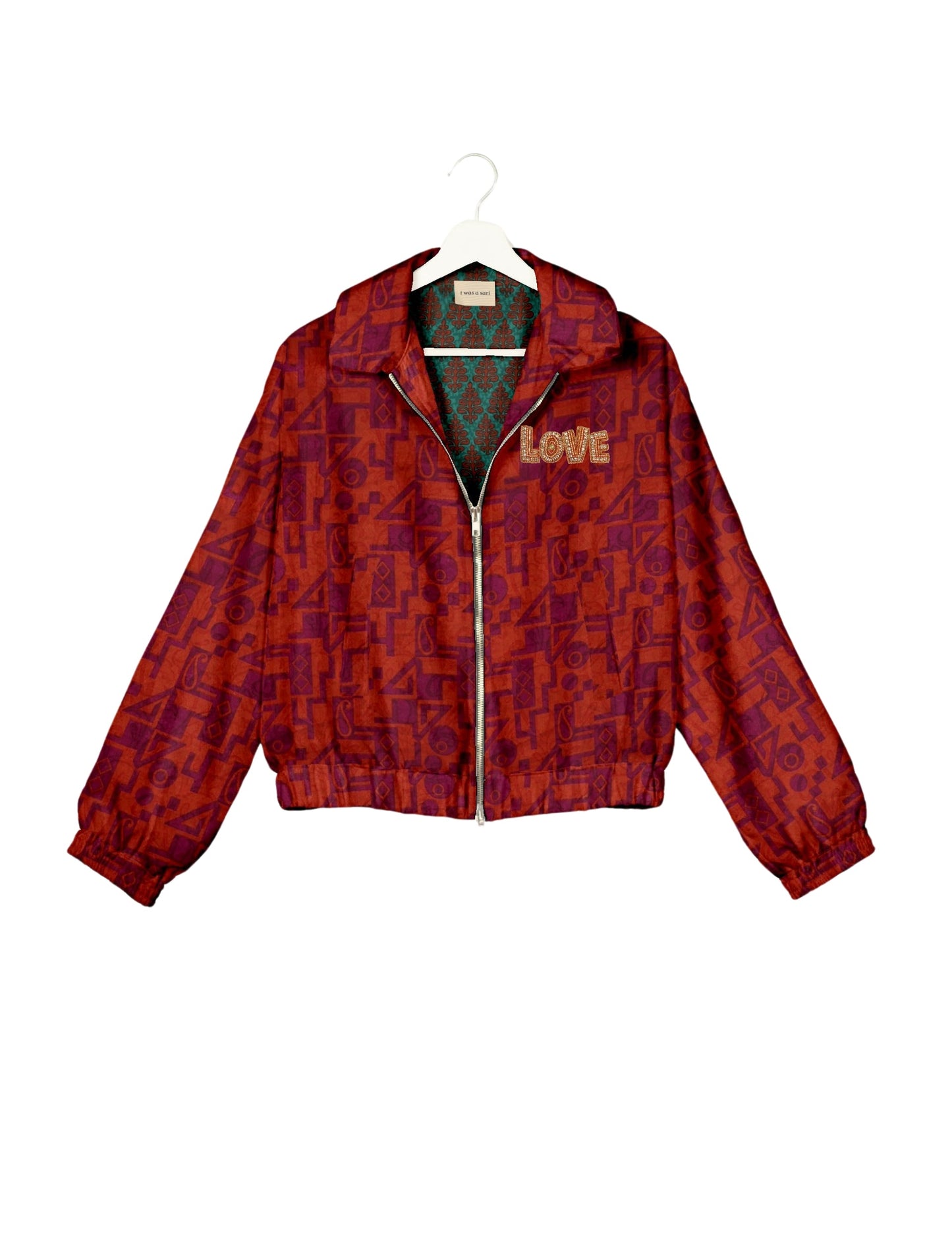 Love Bomber Jacket made from recycled fabric, featuring hand-stitched Aari embroidery. A unique piece of zero-waste clothing, part of the circular fashion movement. Designed with upcycled materials for a stylish yet environmentally friendly clothing choice.