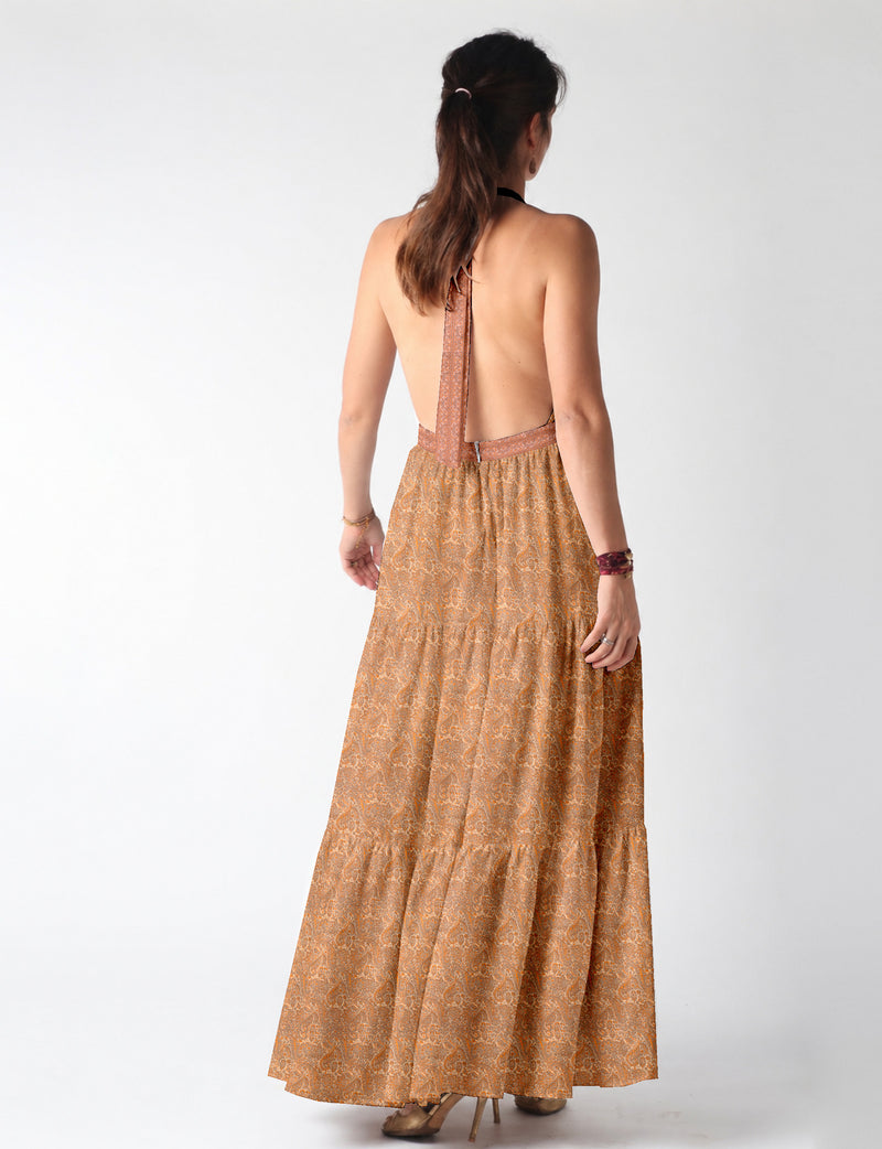 Maxi tiered dress by I was a Sari with halter neckline and flowy silhouette