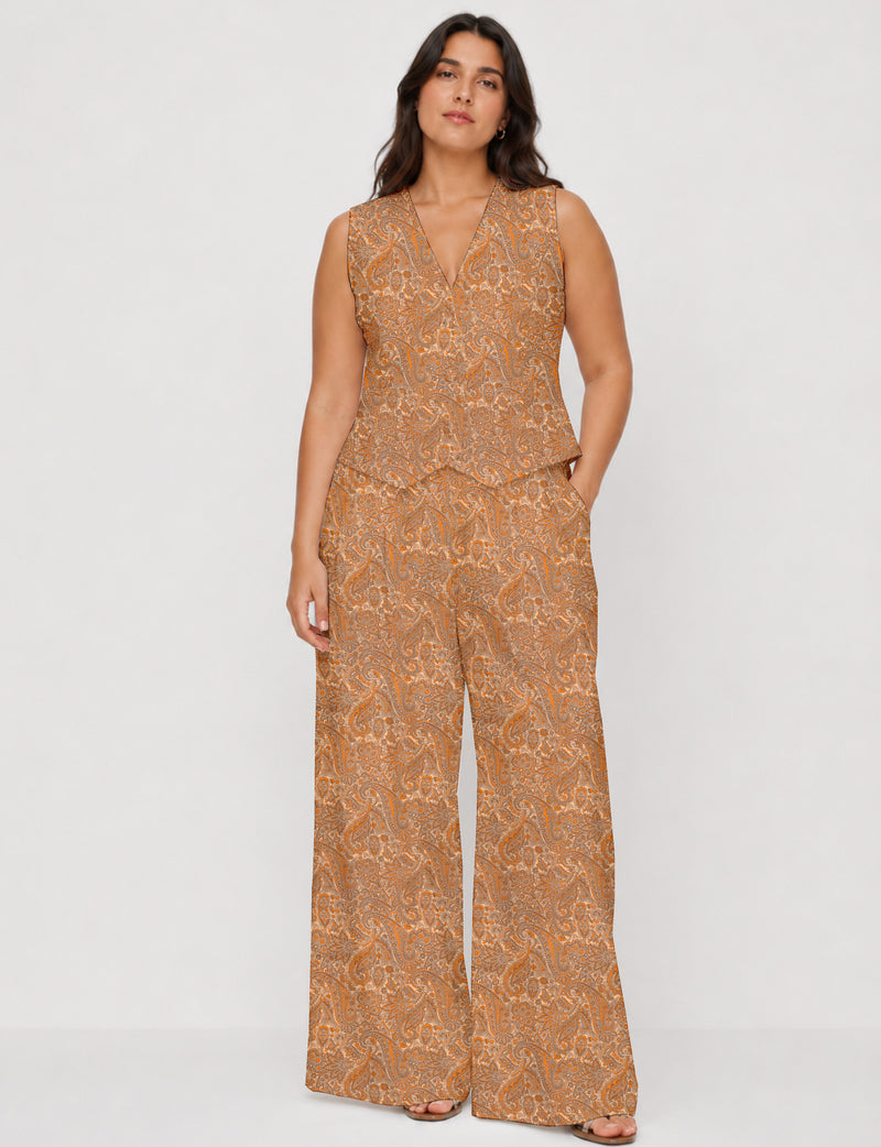 Women's tailored waistcoat set with a sleeveless V-neck button-front waistcoat and high-rise wide leg trousers in a coordinated matching outfit.