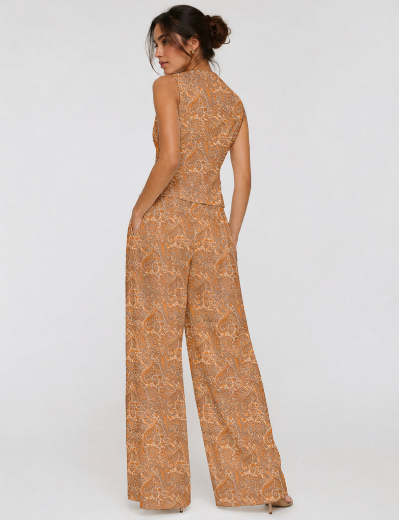 Women's tailored waistcoat set with a sleeveless V-neck button-front waistcoat and high-rise wide leg trousers in a coordinated matching outfit.