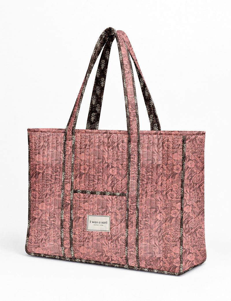 Quilted work tote bag with structured rectangular design and long shoulder straps, representing slow fashion and ethical clothing ideals, made as part of upcycled women's clothing and sustainable women's clothing using recycled fashion and earth friendly clothing practices.
