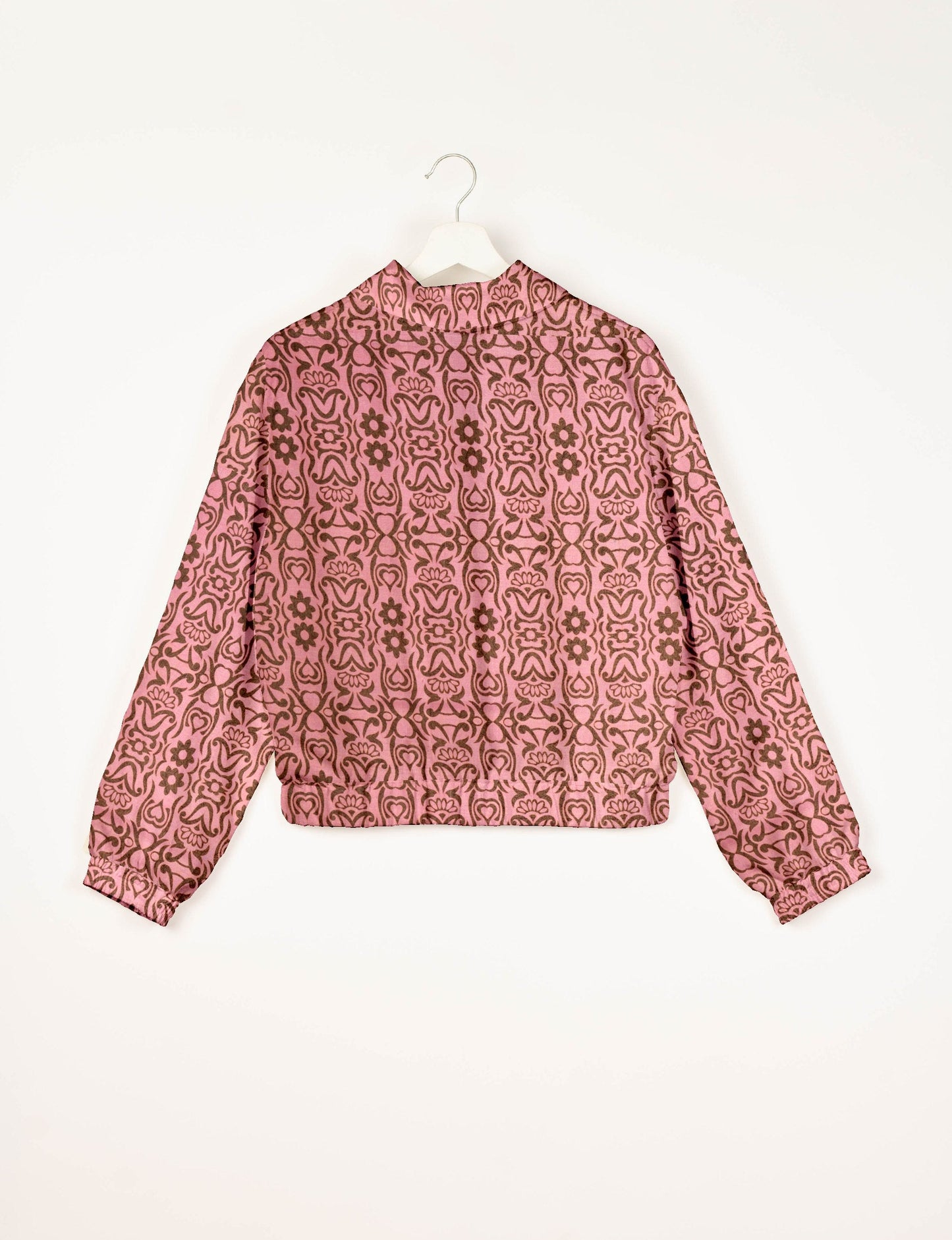 Love Bomber Jacket made from recycled fabric, featuring hand-stitched Aari embroidery. A unique piece of zero-waste clothing, part of the circular fashion movement. Designed with upcycled materials for a stylish yet environmentally friendly clothing choice.