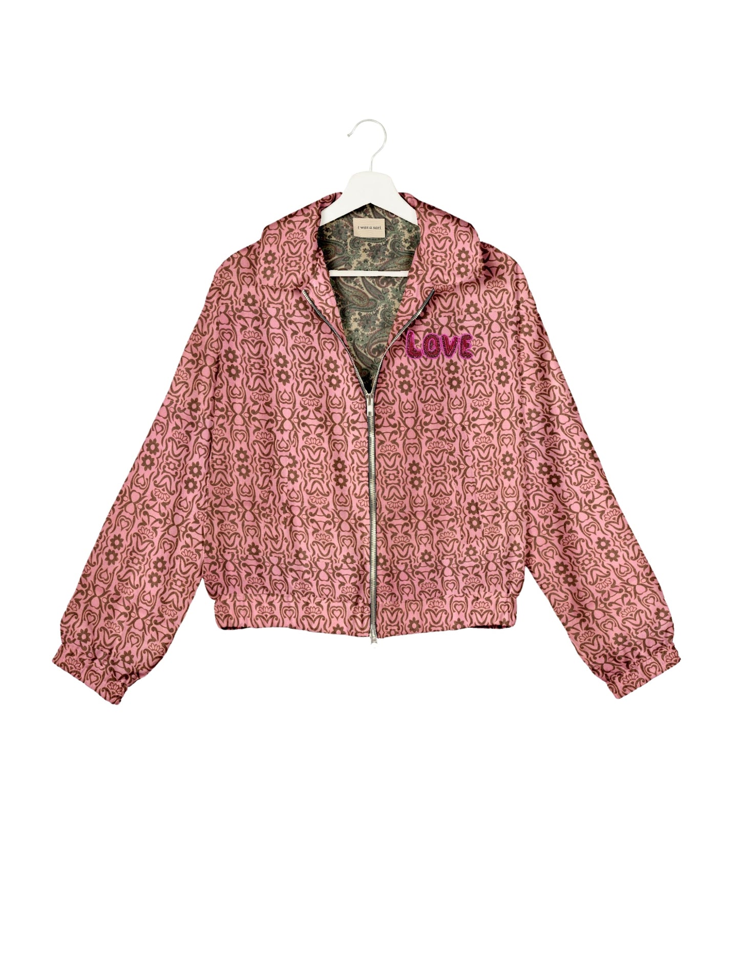 Love Bomber Jacket made from recycled fabric, featuring hand-stitched Aari embroidery. A unique piece of zero-waste clothing, part of the circular fashion movement. Designed with upcycled materials for a stylish yet environmentally friendly clothing choice.