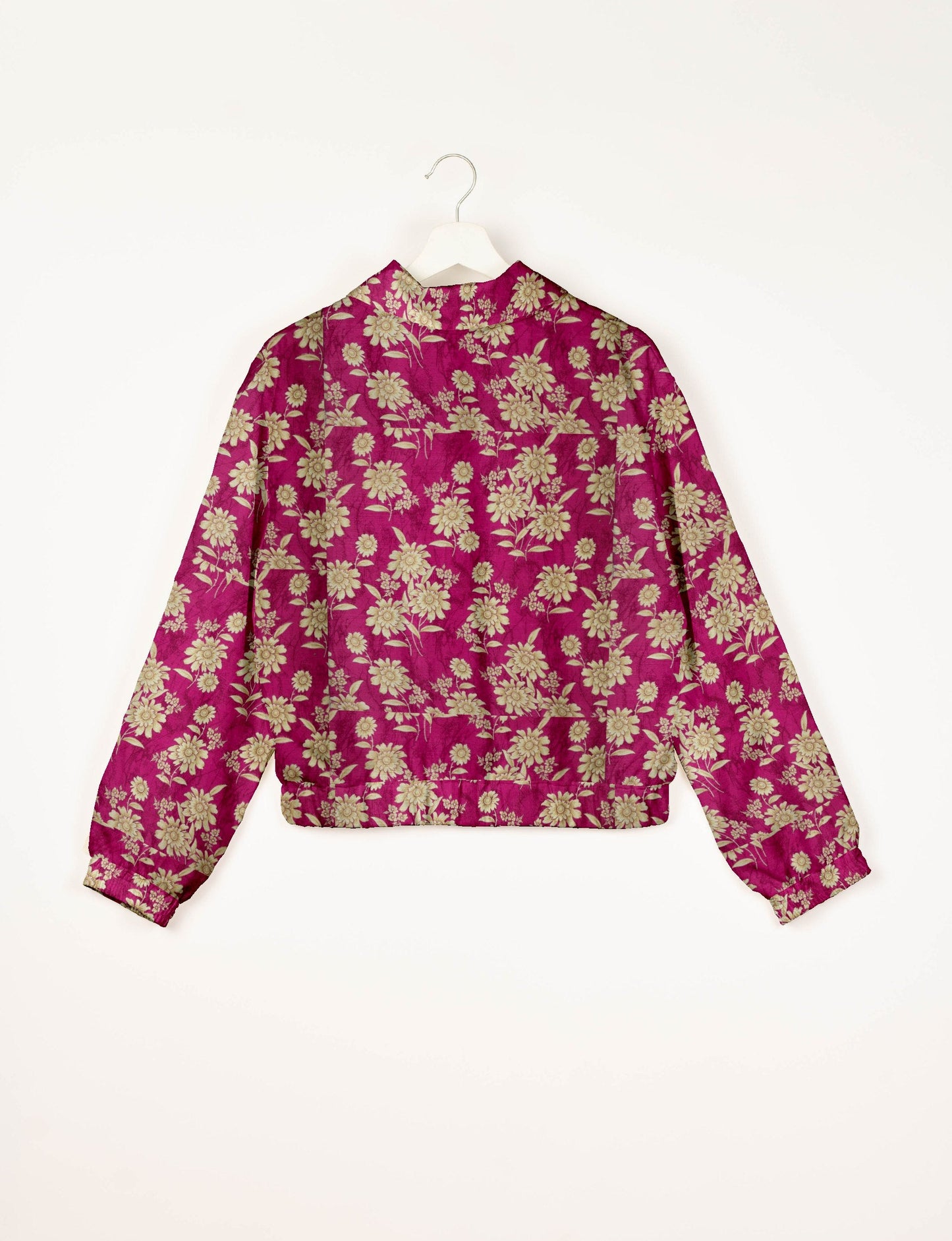 Upcycled Bomber Jacket made from recycled sari materials, featuring a cute cropped shape, elasticated hem and cuffs, and contrast sari print lining. Sustainable apparel promoting eco-friendly fashion and ethical clothing.