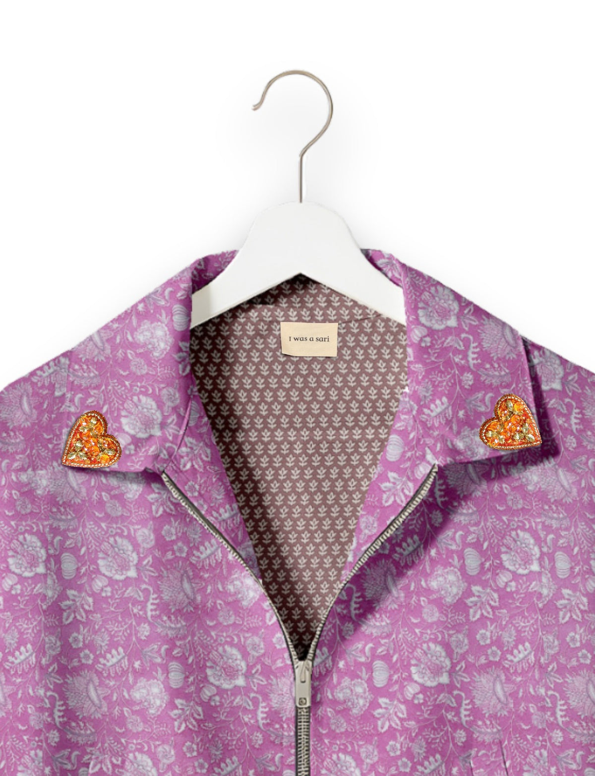 Love Bomber Jacket made from recycled fabric, featuring hand-stitched Aari embroidery. A unique piece of zero-waste clothing, part of the circular fashion movement. Designed with upcycled materials for a stylish yet environmentally friendly clothing choice.