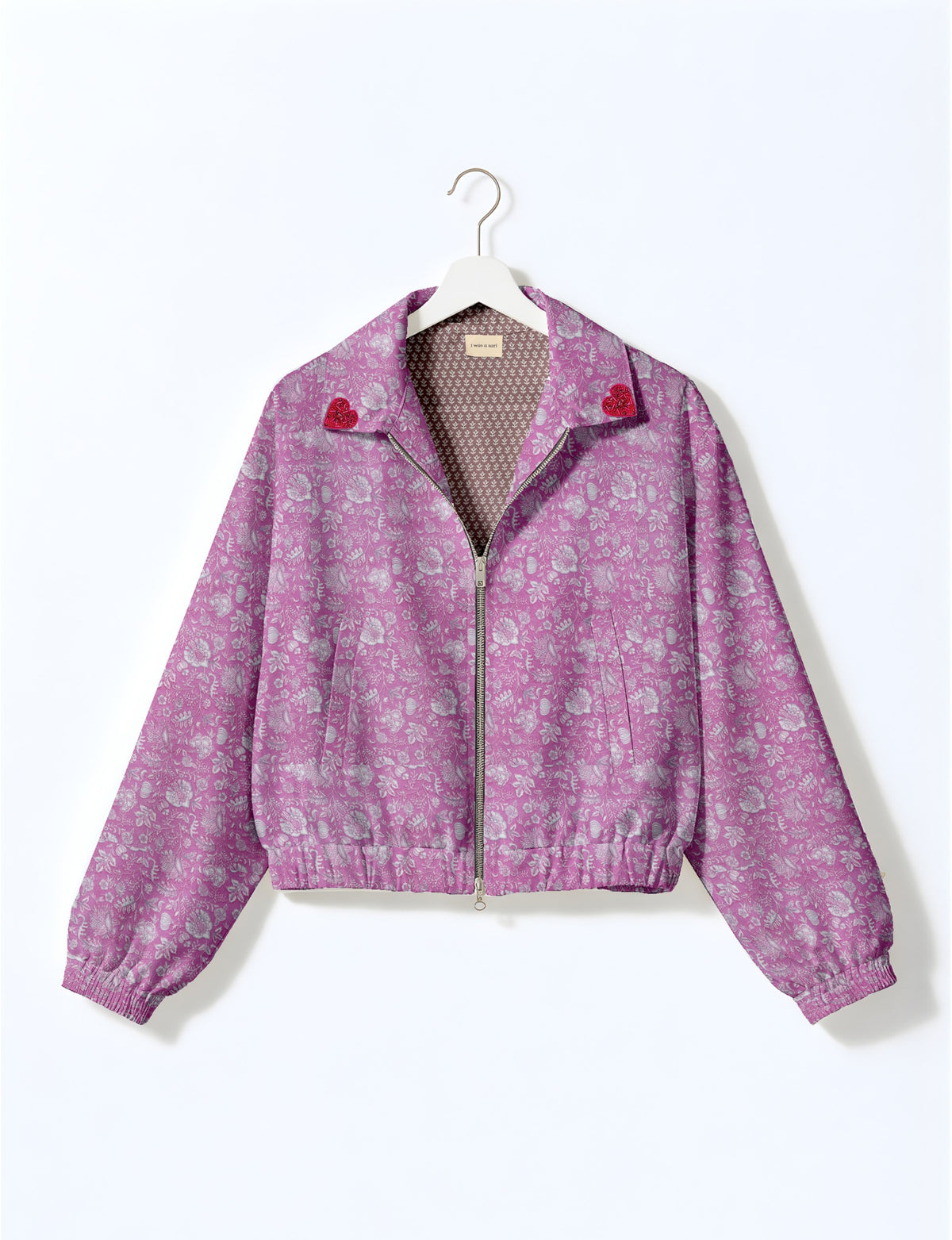Love Bomber Jacket made from recycled fabric, featuring hand-stitched Aari embroidery. A unique piece of zero-waste clothing, part of the circular fashion movement. Designed with upcycled materials for a stylish yet environmentally friendly clothing choice.