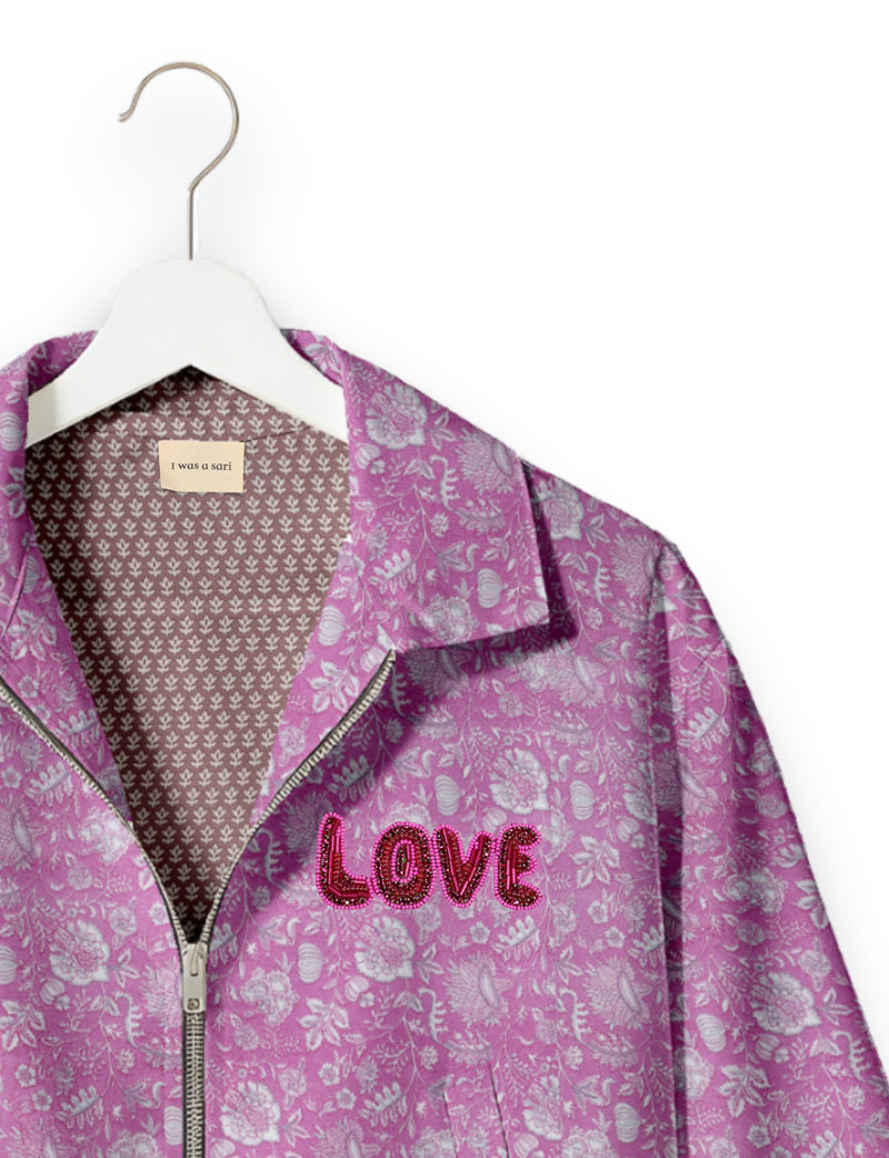 Love Bomber Jacket made from recycled fabric, featuring hand-stitched Aari embroidery. A unique piece of zero-waste clothing, part of the circular fashion movement. Designed with upcycled materials for a stylish yet environmentally friendly clothing choice.