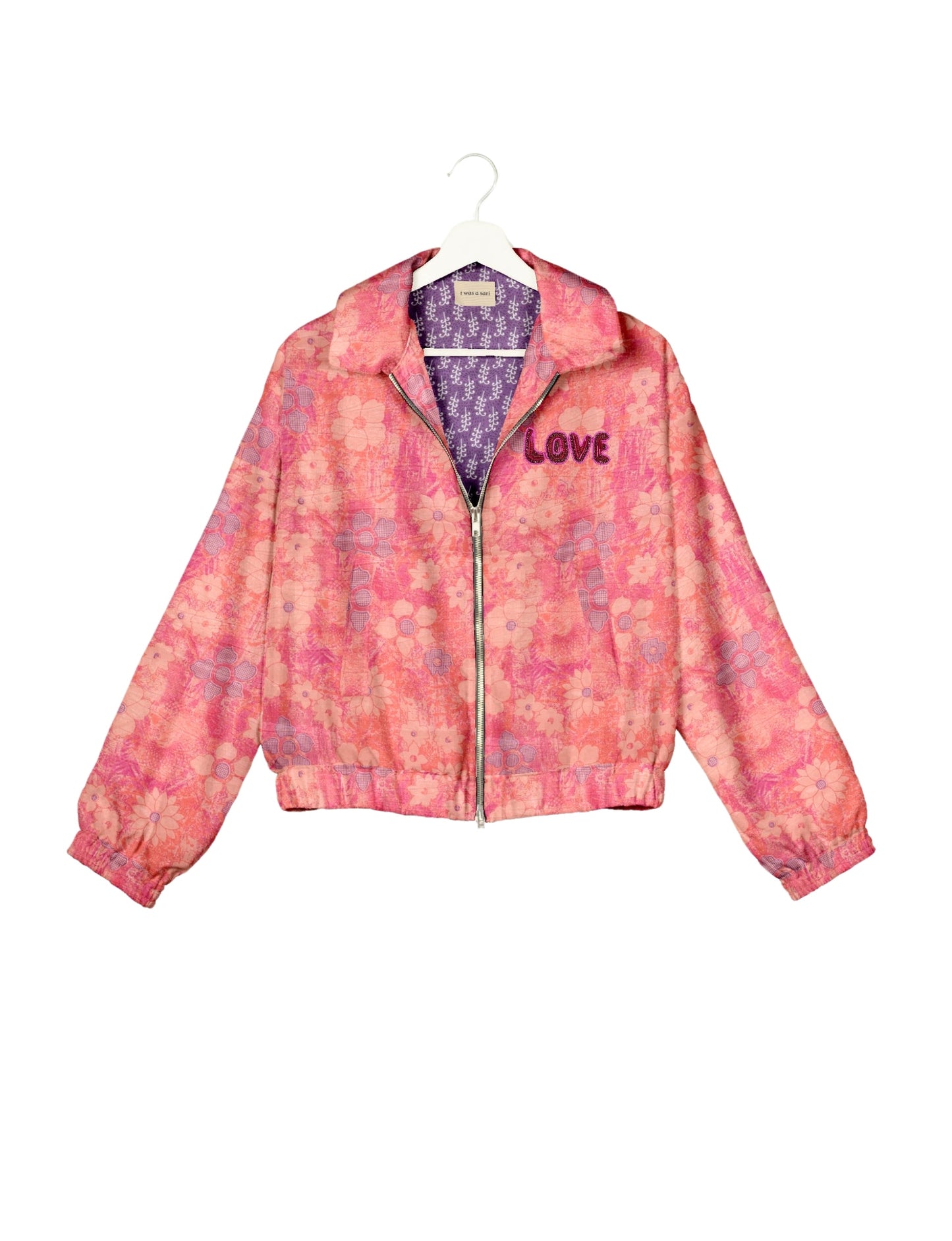 Love Bomber Jacket made from recycled fabric, featuring hand-stitched Aari embroidery. A unique piece of zero-waste clothing, part of the circular fashion movement. Designed with upcycled materials for a stylish yet environmentally friendly clothing choice.