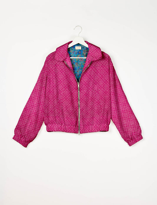 Upcycled Bomber Jacket made from recycled sari materials, featuring a cute cropped shape, elasticated hem and cuffs, and contrast sari print lining. Sustainable apparel promoting eco-friendly fashion and ethical clothing.