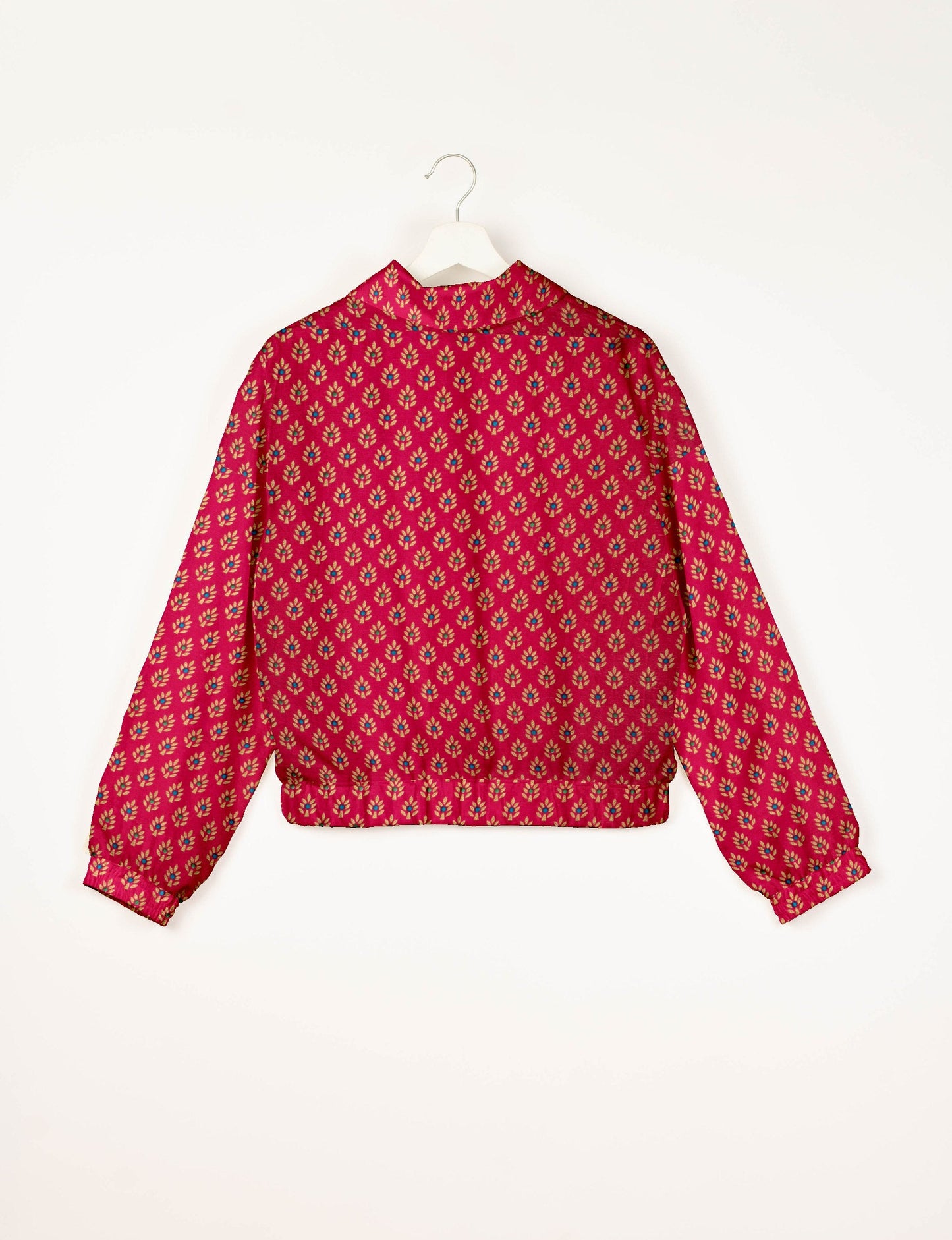 Love Bomber Jacket made from recycled fabric, featuring hand-stitched Aari embroidery. A unique piece of zero-waste clothing, part of the circular fashion movement. Designed with upcycled materials for a stylish yet environmentally friendly clothing choice.