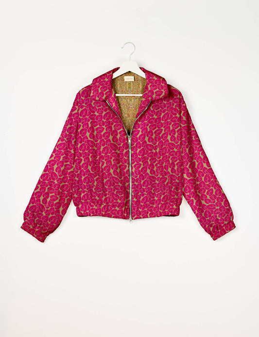 Upcycled Bomber Jacket made from recycled sari materials, featuring a cute cropped shape, elasticated hem and cuffs, and contrast sari print lining. Sustainable apparel promoting eco-friendly fashion and ethical clothing.