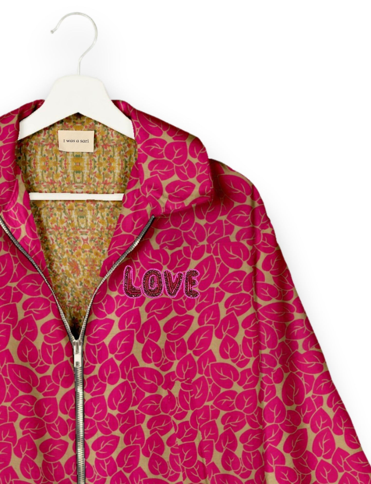 Love Bomber Jacket made from recycled fabric, featuring hand-stitched Aari embroidery. A unique piece of zero-waste clothing, part of the circular fashion movement. Designed with upcycled materials for a stylish yet environmentally friendly clothing choice.