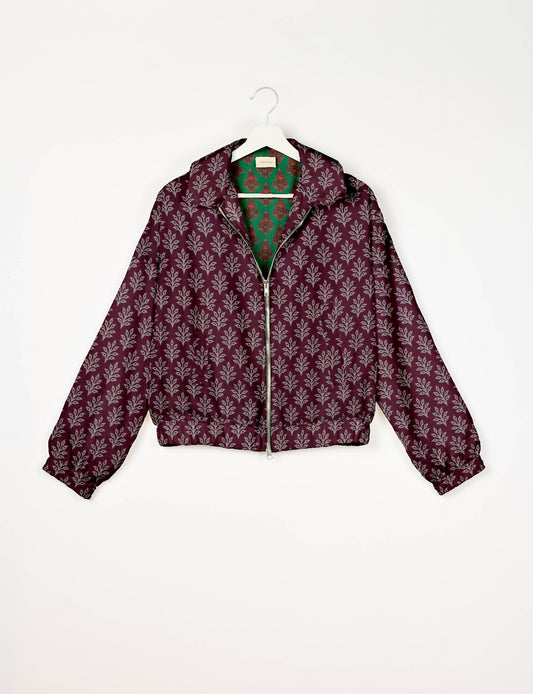 Upcycled Bomber Jacket made from recycled sari materials, featuring a cute cropped shape, elasticated hem and cuffs, and contrast sari print lining. Sustainable apparel promoting eco-friendly fashion and ethical clothing.