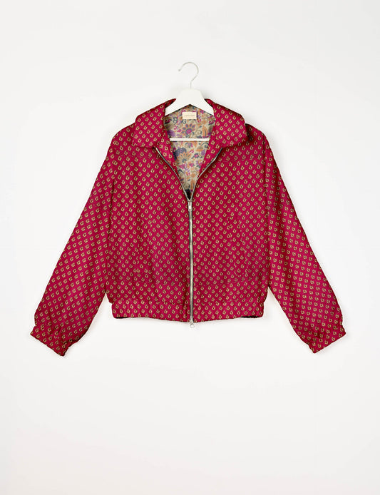 Upcycled Bomber Jacket made from recycled sari materials, featuring a cute cropped shape, elasticated hem and cuffs, and contrast sari print lining. Sustainable apparel promoting eco-friendly fashion and ethical clothing.