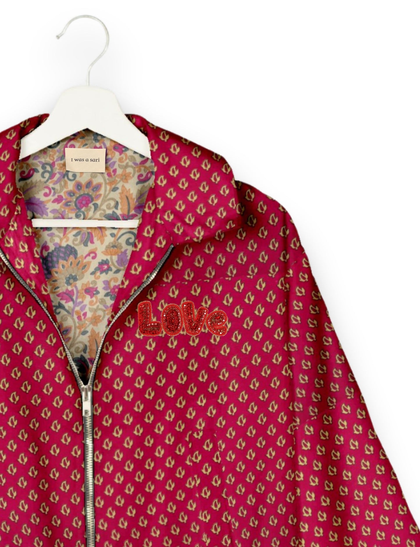 Love Bomber Jacket made from recycled fabric, featuring hand-stitched Aari embroidery. A unique piece of zero-waste clothing, part of the circular fashion movement. Designed with upcycled materials for a stylish yet environmentally friendly clothing choice.