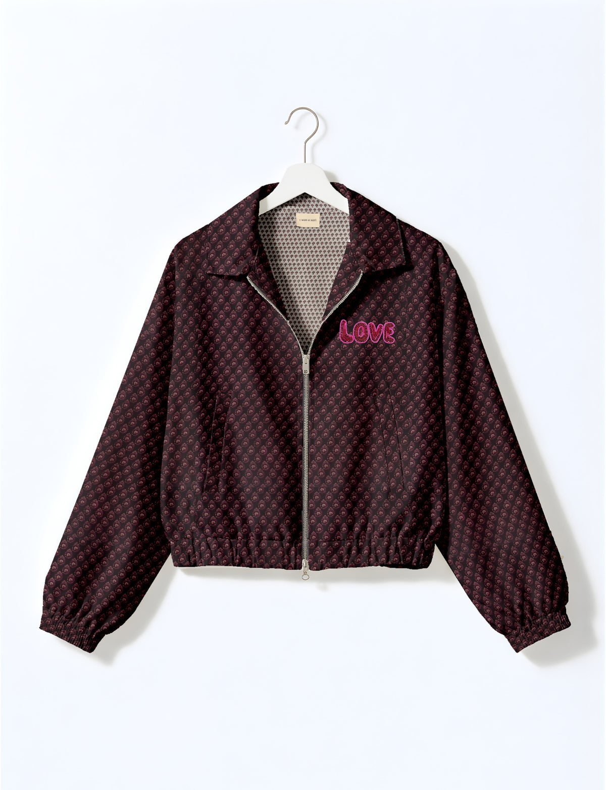 Love Bomber Jacket made from recycled fabric, featuring hand-stitched Aari embroidery. A unique piece of zero-waste clothing, part of the circular fashion movement. Designed with upcycled materials for a stylish yet environmentally friendly clothing choice.