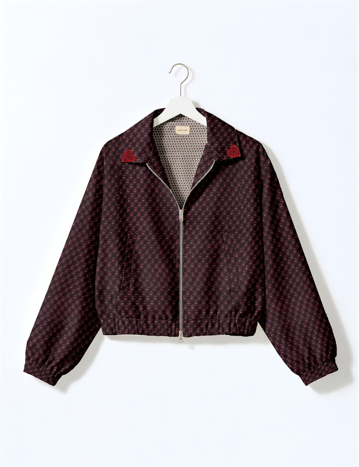 Love Bomber Jacket made from recycled fabric, featuring hand-stitched Aari embroidery. A unique piece of zero-waste clothing, part of the circular fashion movement. Designed with upcycled materials for a stylish yet environmentally friendly clothing choice.
