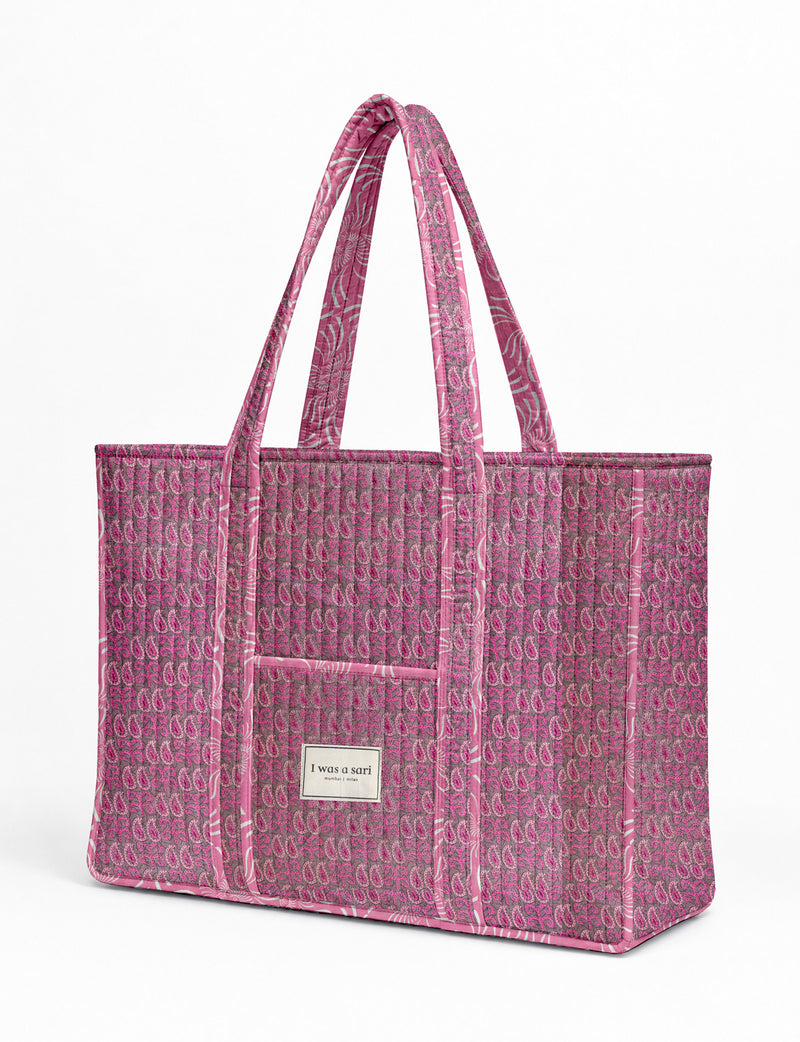 Quilted work tote bag with structured rectangular design and long shoulder straps, representing slow fashion and ethical clothing ideals, made as part of upcycled women's clothing and sustainable women's clothing using recycled fashion and earth friendly clothing practices.