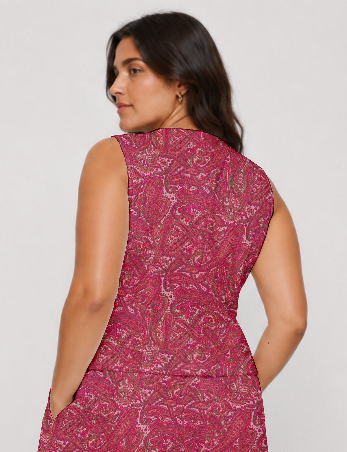 Women's fitted waistcoat with V-neck, single-breasted button closure, tailored silhouette, and pointed hem in sustainable fashion.