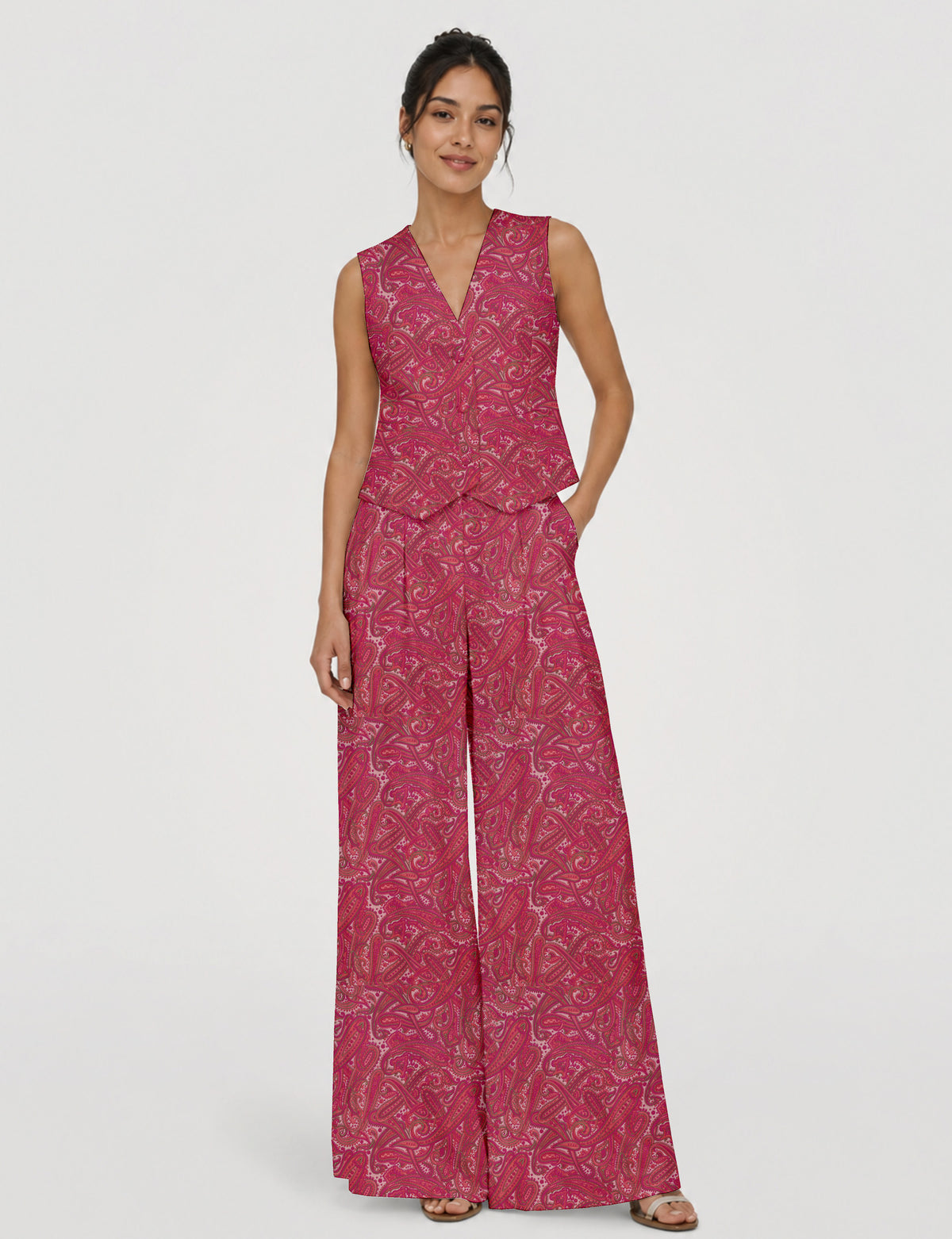Women's tailored waistcoat set with a sleeveless V-neck button-front waistcoat and high-rise wide leg trousers in a coordinated matching outfit.