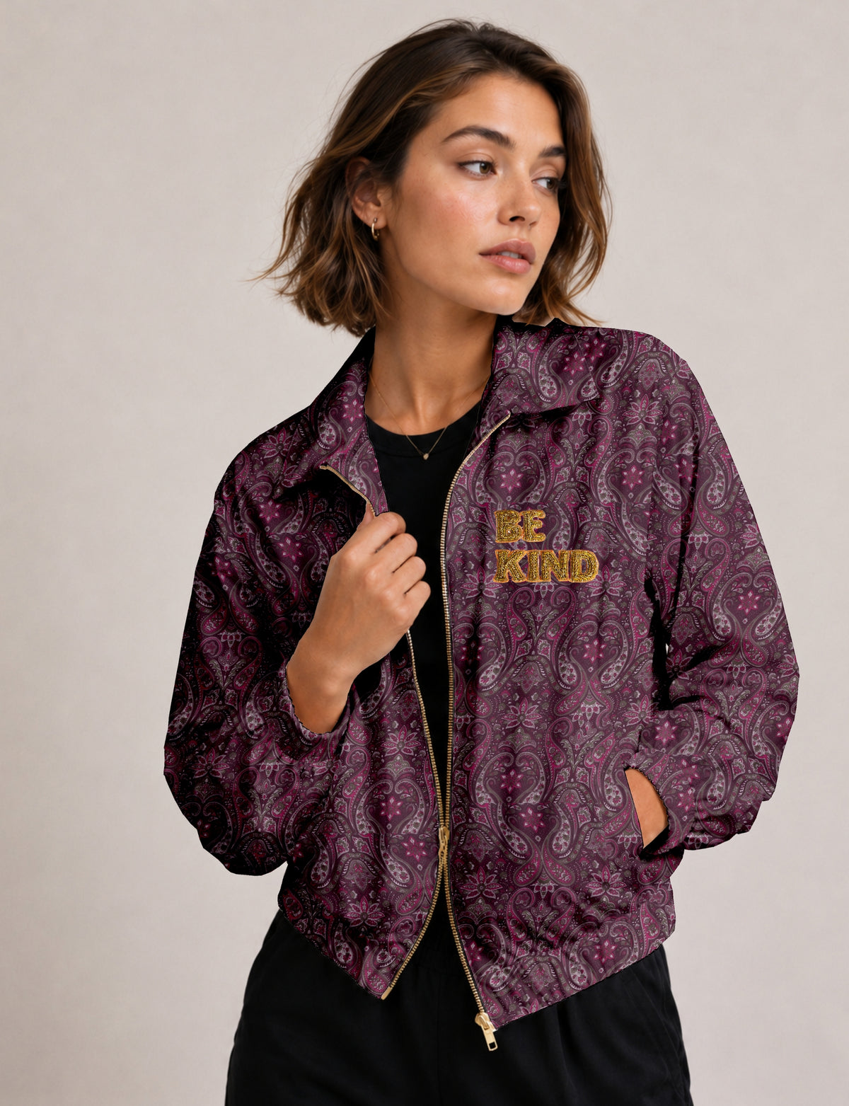 BE KIND Bomber jacket made from upcycled sari fabric with handcrafted Aari embroidery by female artisans.