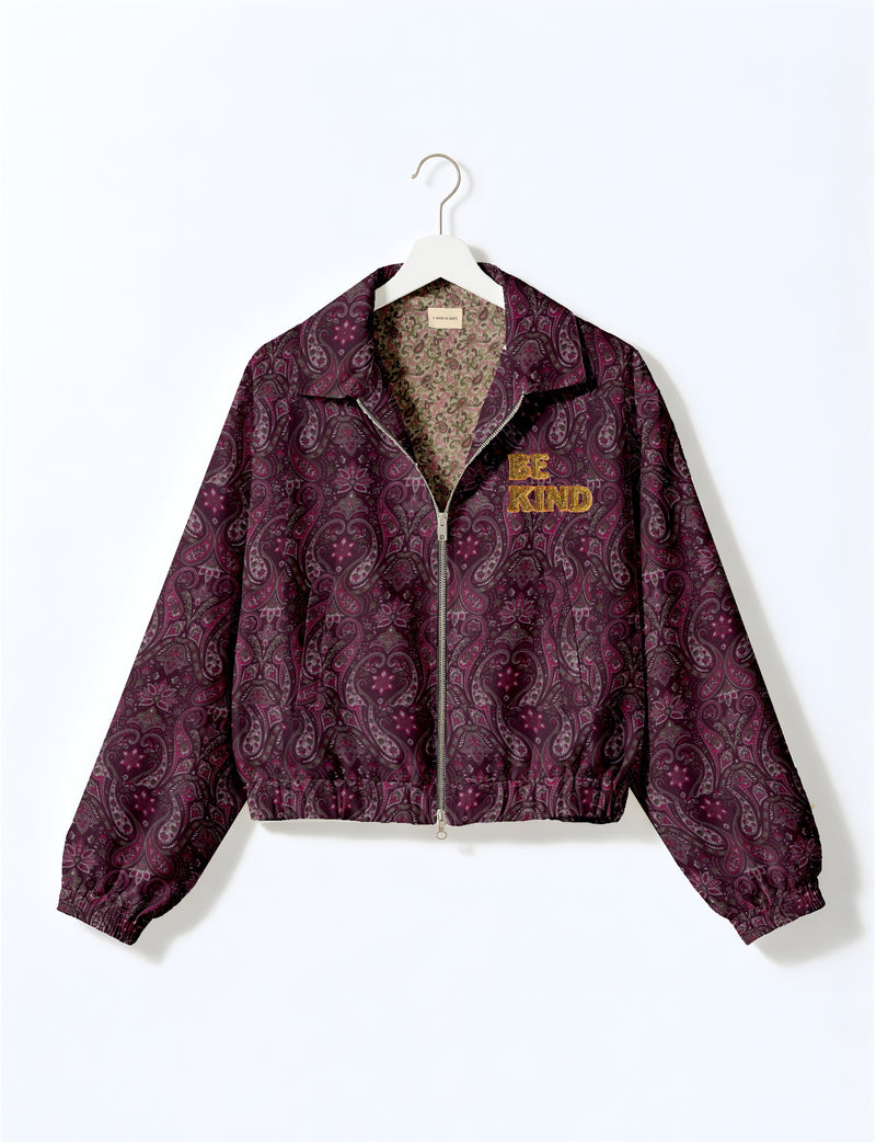 BE KIND Bomber jacket made from upcycled sari fabric with handcrafted Aari embroidery by female artisans.