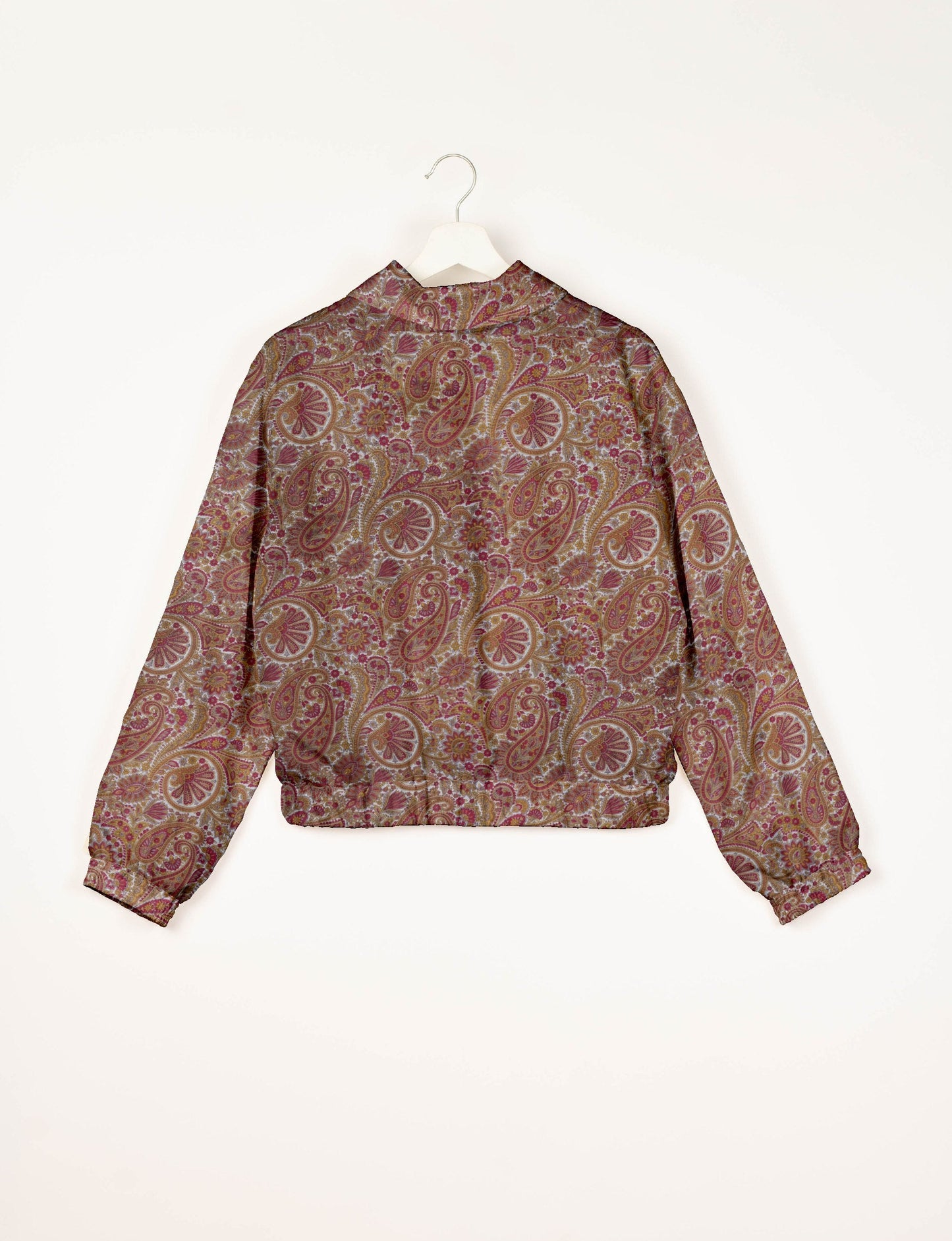 Upcycled Bomber Jacket made from recycled sari materials, featuring a cute cropped shape, elasticated hem and cuffs, and contrast sari print lining. Sustainable apparel promoting eco-friendly fashion and ethical clothing.