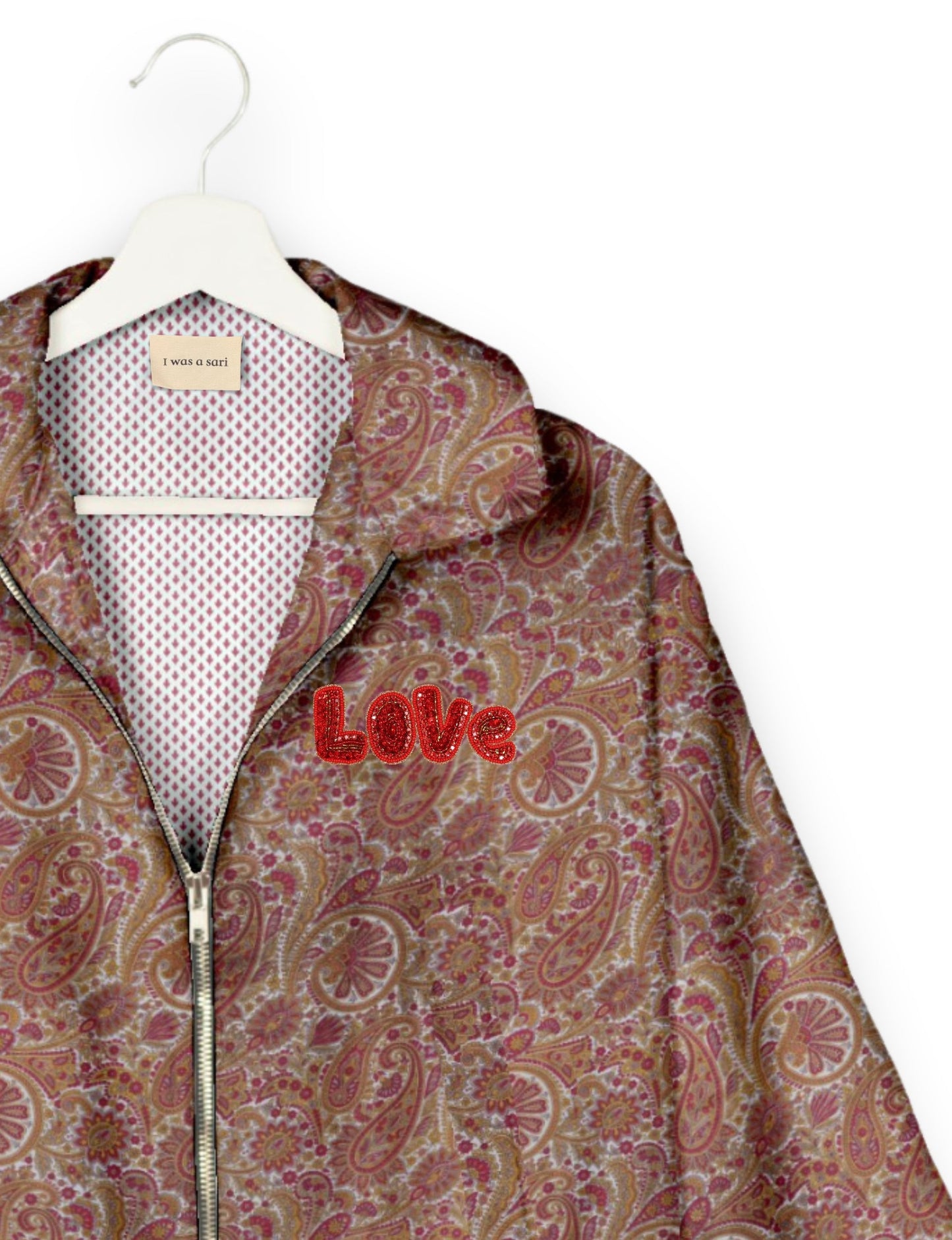 Love Bomber Jacket made from recycled fabric, featuring hand-stitched Aari embroidery. A unique piece of zero-waste clothing, part of the circular fashion movement. Designed with upcycled materials for a stylish yet environmentally friendly clothing choice.