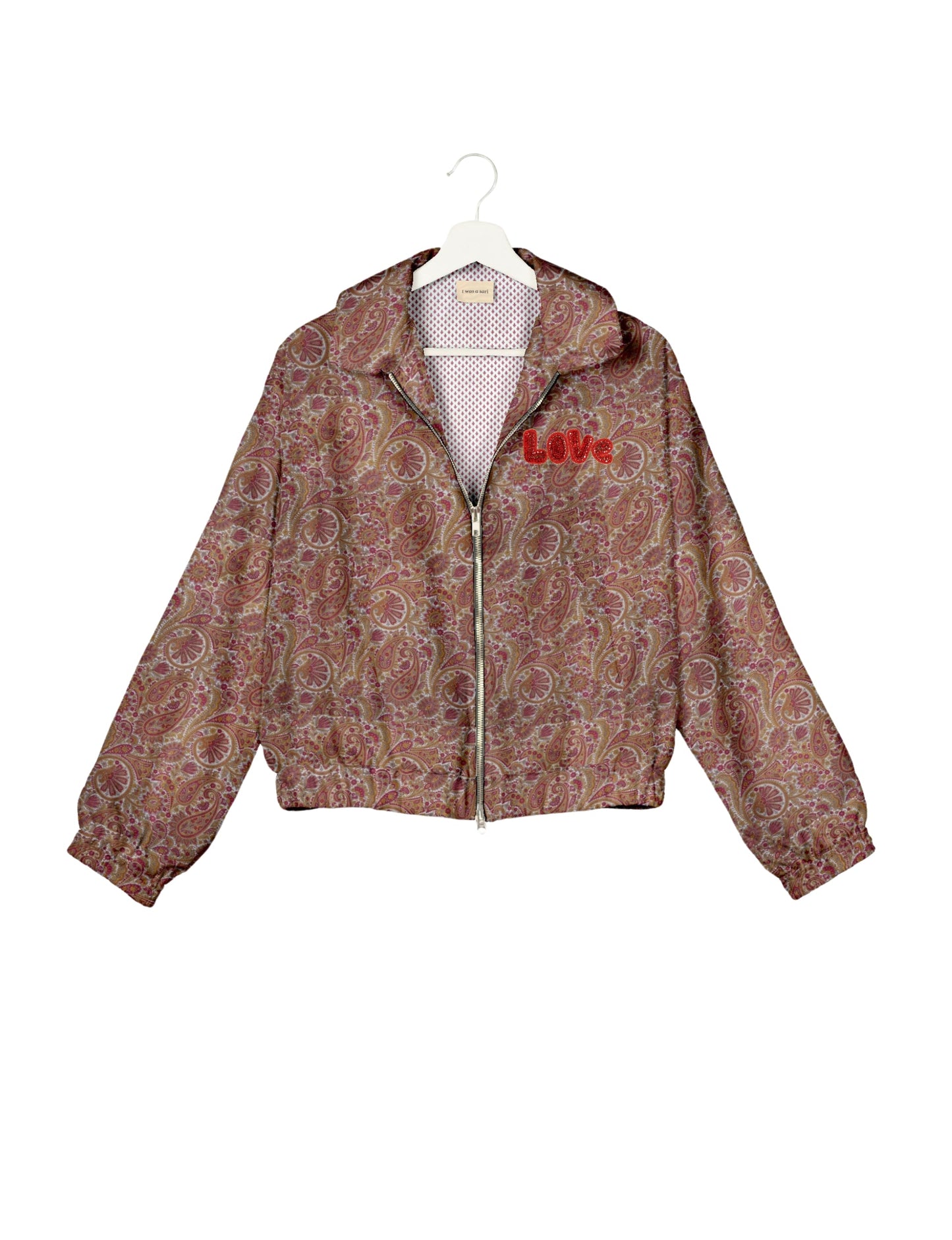 Love Bomber Jacket made from recycled fabric, featuring hand-stitched Aari embroidery. A unique piece of zero-waste clothing, part of the circular fashion movement. Designed with upcycled materials for a stylish yet environmentally friendly clothing choice.