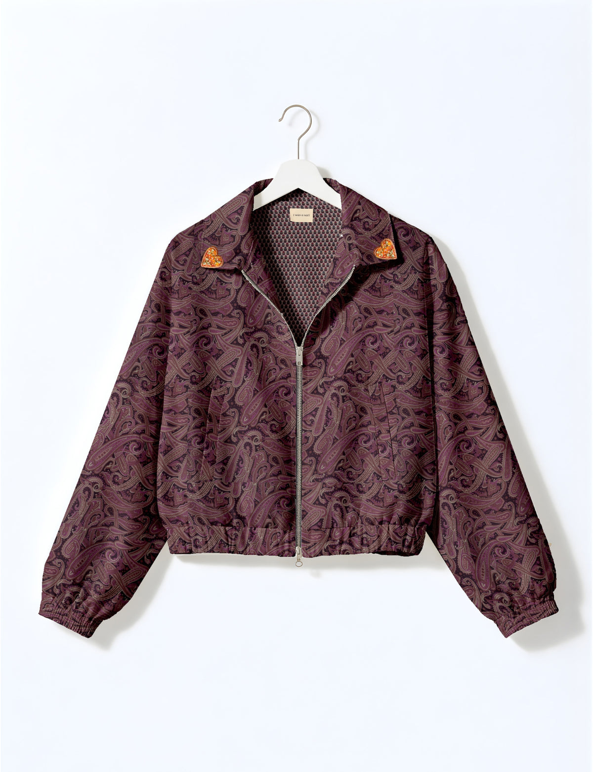 Love Bomber Jacket made from recycled fabric, featuring hand-stitched Aari embroidery. A unique piece of zero-waste clothing, part of the circular fashion movement. Designed with upcycled materials for a stylish yet environmentally friendly clothing choice.