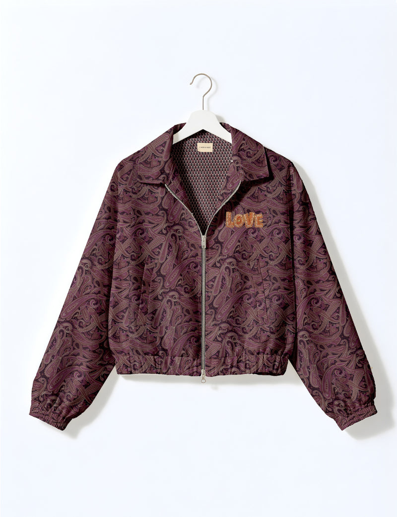 Love Bomber Jacket made from recycled fabric, featuring hand-stitched Aari embroidery. A unique piece of zero-waste clothing, part of the circular fashion movement. Designed with upcycled materials for a stylish yet environmentally friendly clothing choice.