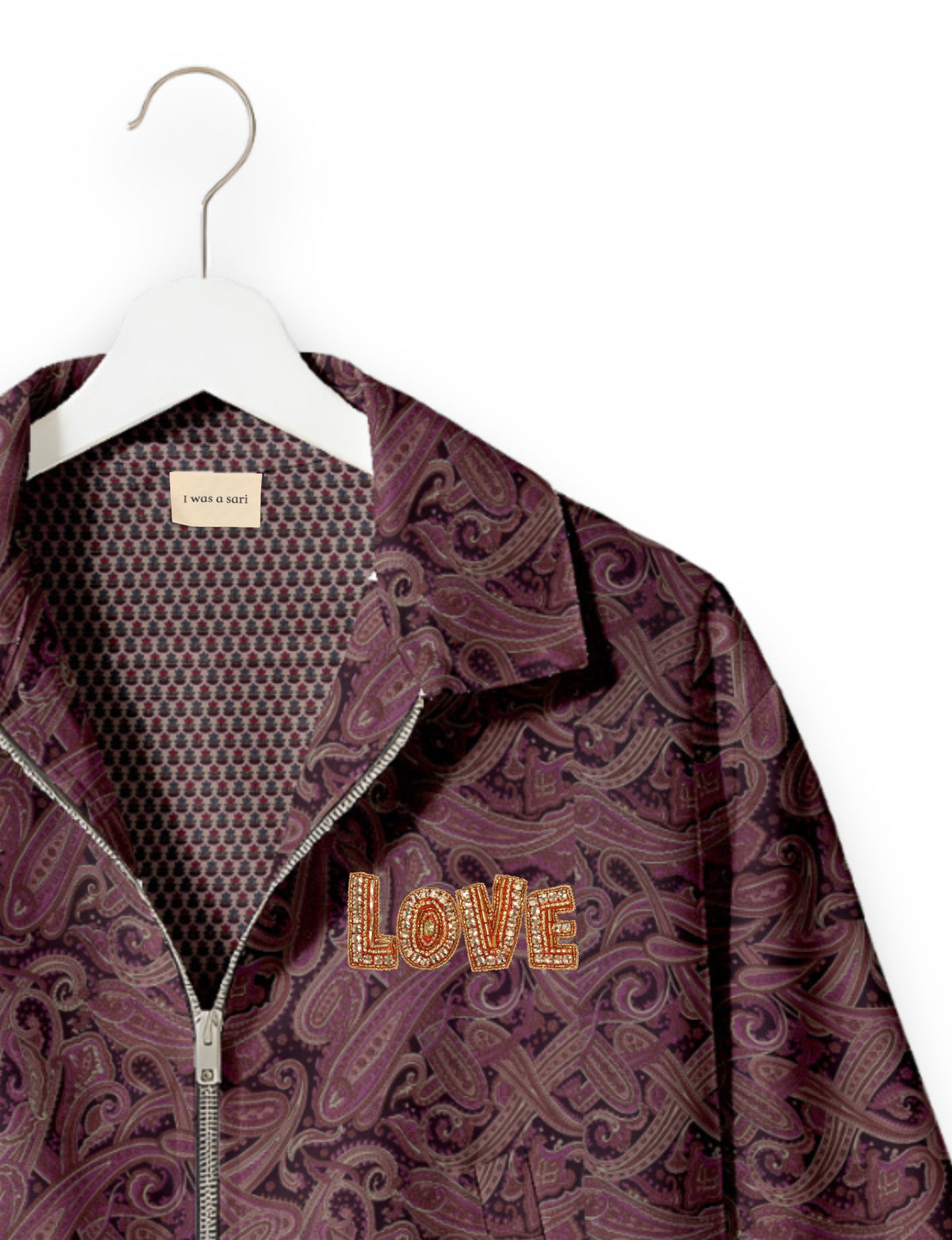 Love Bomber Jacket made from recycled fabric, featuring hand-stitched Aari embroidery. A unique piece of zero-waste clothing, part of the circular fashion movement. Designed with upcycled materials for a stylish yet environmentally friendly clothing choice.