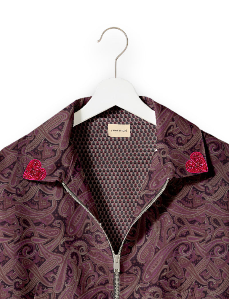 Love Bomber Jacket made from recycled fabric, featuring hand-stitched Aari embroidery. A unique piece of zero-waste clothing, part of the circular fashion movement. Designed with upcycled materials for a stylish yet environmentally friendly clothing choice.