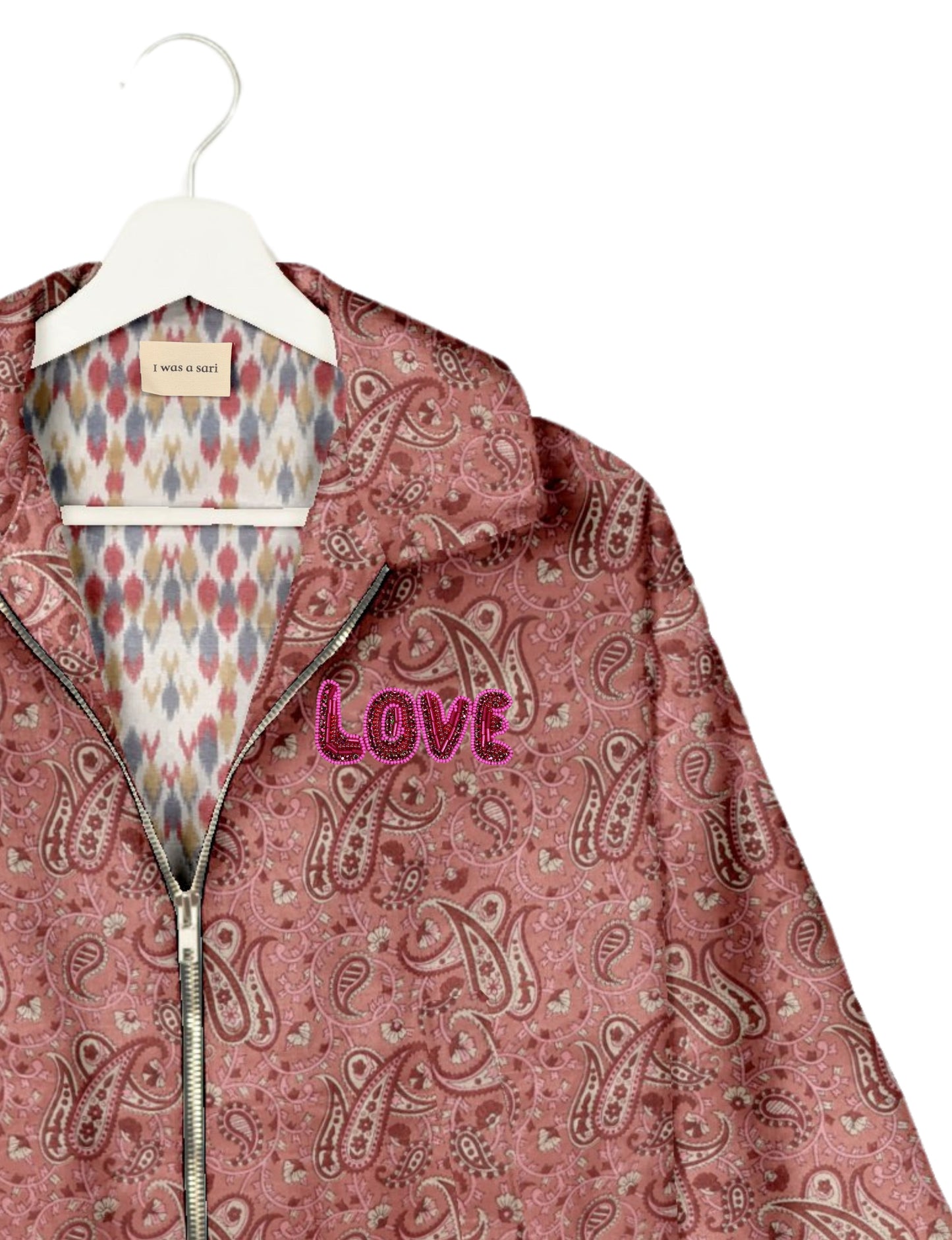 Love Bomber Jacket made from recycled fabric, featuring hand-stitched Aari embroidery. A unique piece of zero-waste clothing, part of the circular fashion movement. Designed with upcycled materials for a stylish yet environmentally friendly clothing choice.