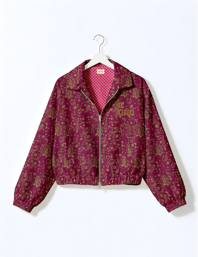 BE KIND Bomber jacket made from upcycled sari fabric with handcrafted Aari embroidery by female artisans.