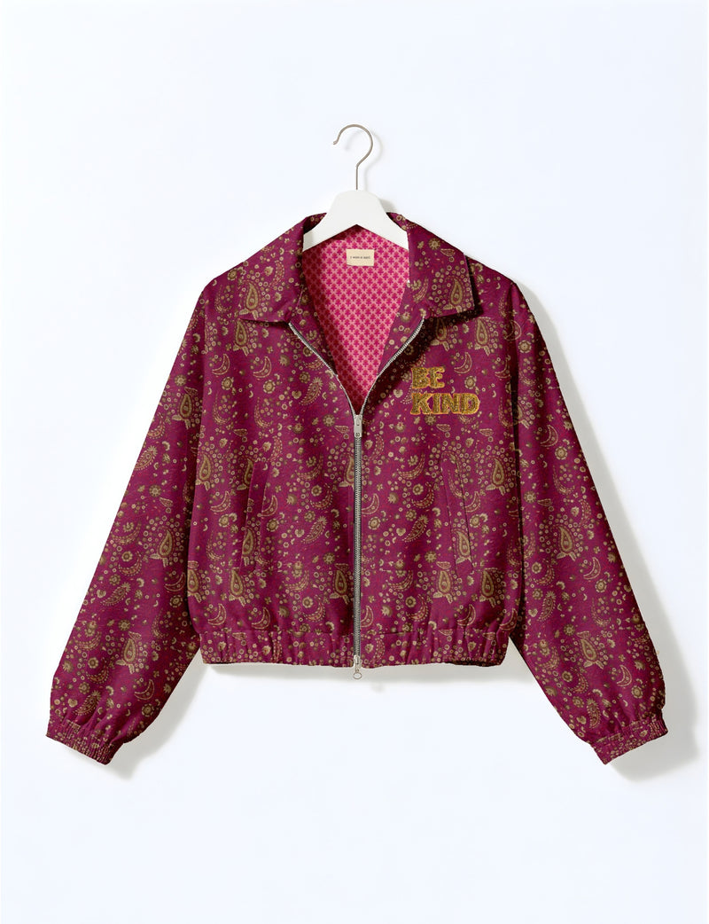 BE KIND Bomber jacket made from upcycled sari fabric with handcrafted Aari embroidery by female artisans.