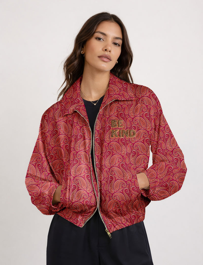 BE KIND Bomber jacket made from upcycled sari fabric with handcrafted Aari embroidery by female artisans.